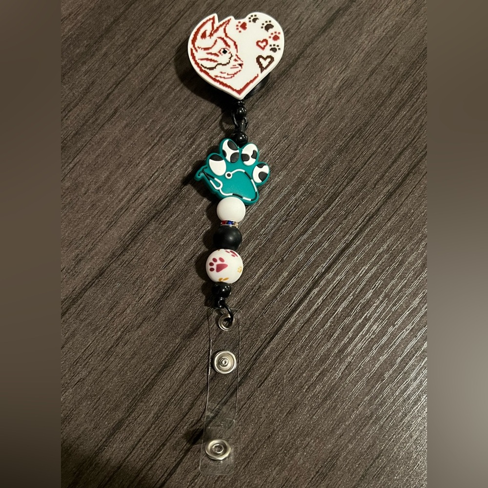 Cat badge reel